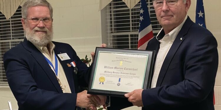 Colby Smith accepts Distinguished Medal Award honoring his father