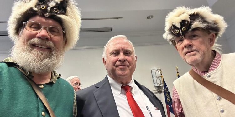 Mercer receives medal and certificate