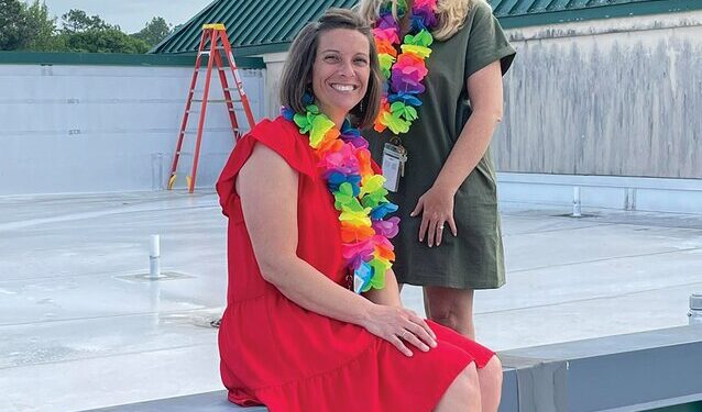 TCE Admin spends the day on the roof for Reading Challenge