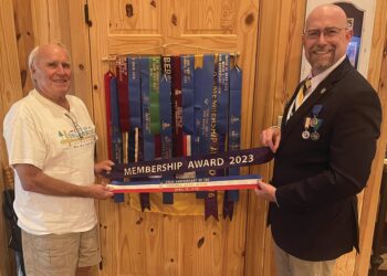 President Rigel attends Patrick Carr meeting