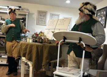 Burke and Martin speak to McLeod/Moring Camp