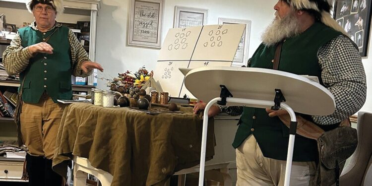 Burke and Martin speak to McLeod/Moring Camp