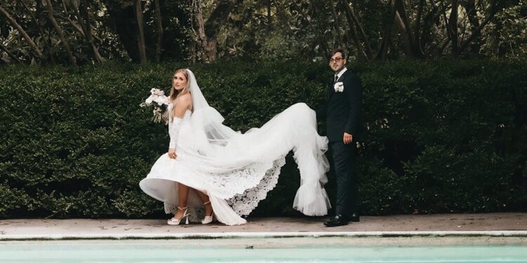 Miss Hall, Mr. Williams exchange vows