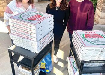 SPS PTO surprises staff with pizza