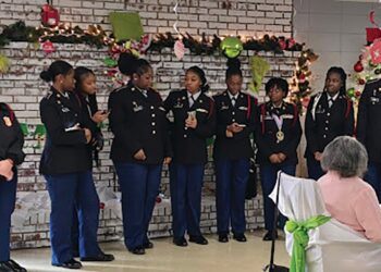 ECI JROTC Cadets bring holiday cheer to Twin View Rehab Center