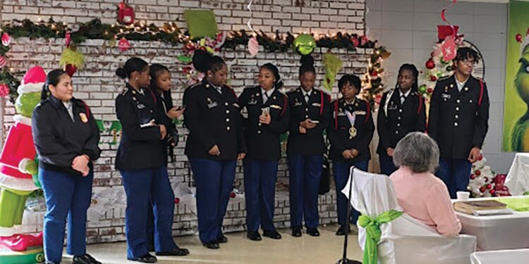 ECI JROTC Cadets bring holiday cheer to Twin View Rehab Center