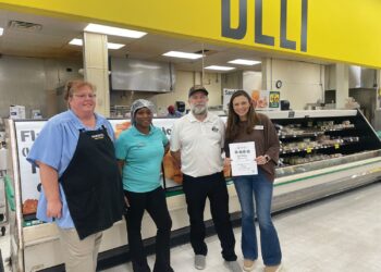 Harvey’s and Men’s Golf Association make donations