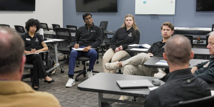 (Photo by Sara Ingram, UGA) A group of PROPEL Rural Scholars visited Emanuel County for an after-storm debrief. For their internship project, these scholars are to provide Emanuel County with tangible steps for improvement in disaster management and mitigation following Hurricane Helene. After a discussion with community stakeholders, the students toured storm impacted areas.
