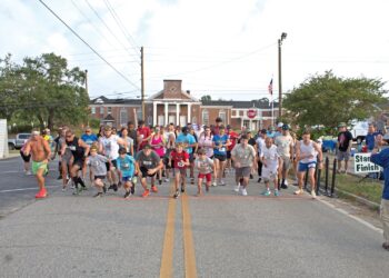 John Buxton and Virginia Palumbo win First Place in 2025 Knotty Pine 5K!