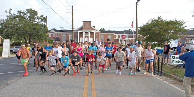 John Buxton and Virginia Palumbo win First Place in 2025 Knotty Pine 5K!