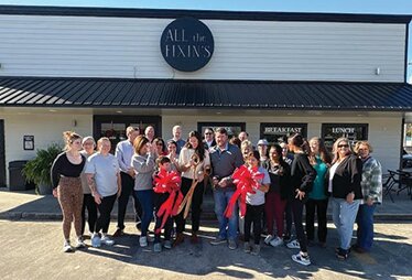 All the Fixins’ holds ribbon cutting