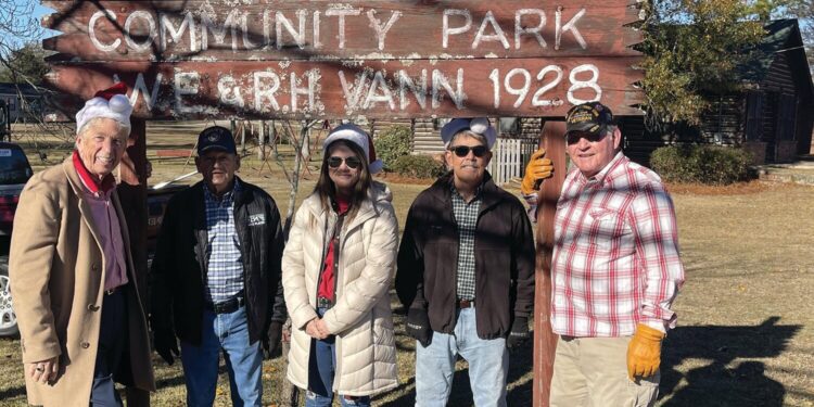 Veterans at the Library restore historic Vann sign