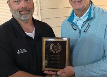 Drake presented President’s Award at Exchange meeting