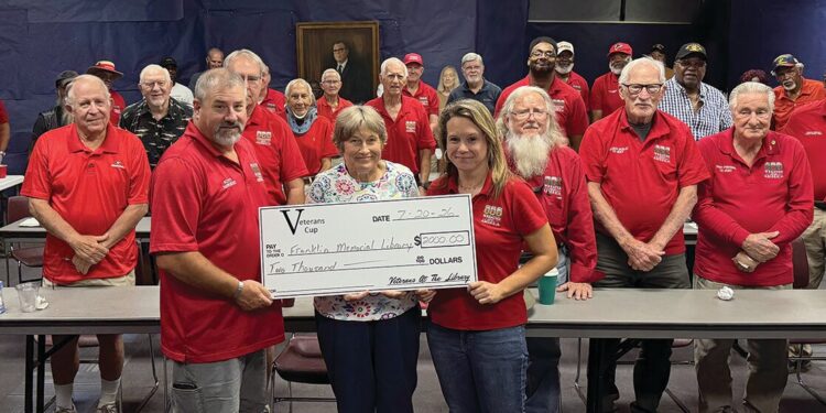 Nasworthy presents check to Franklin Memorial Library